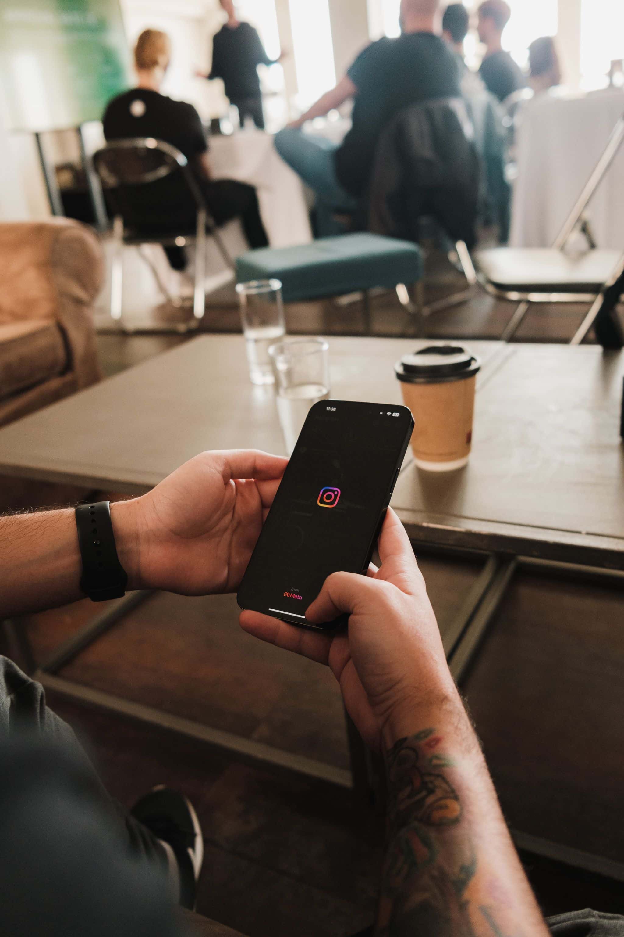 Instagram open on a phone during a business work session