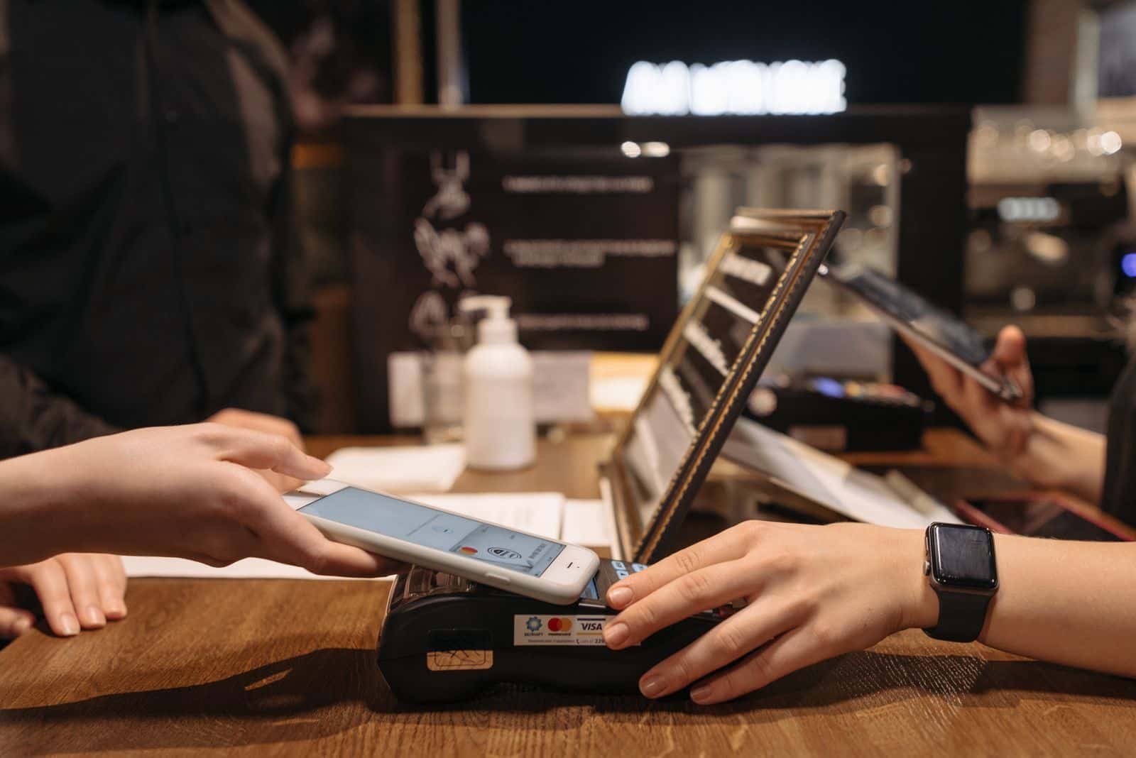 Phone and laptop showing digital payment for a Saudi online store