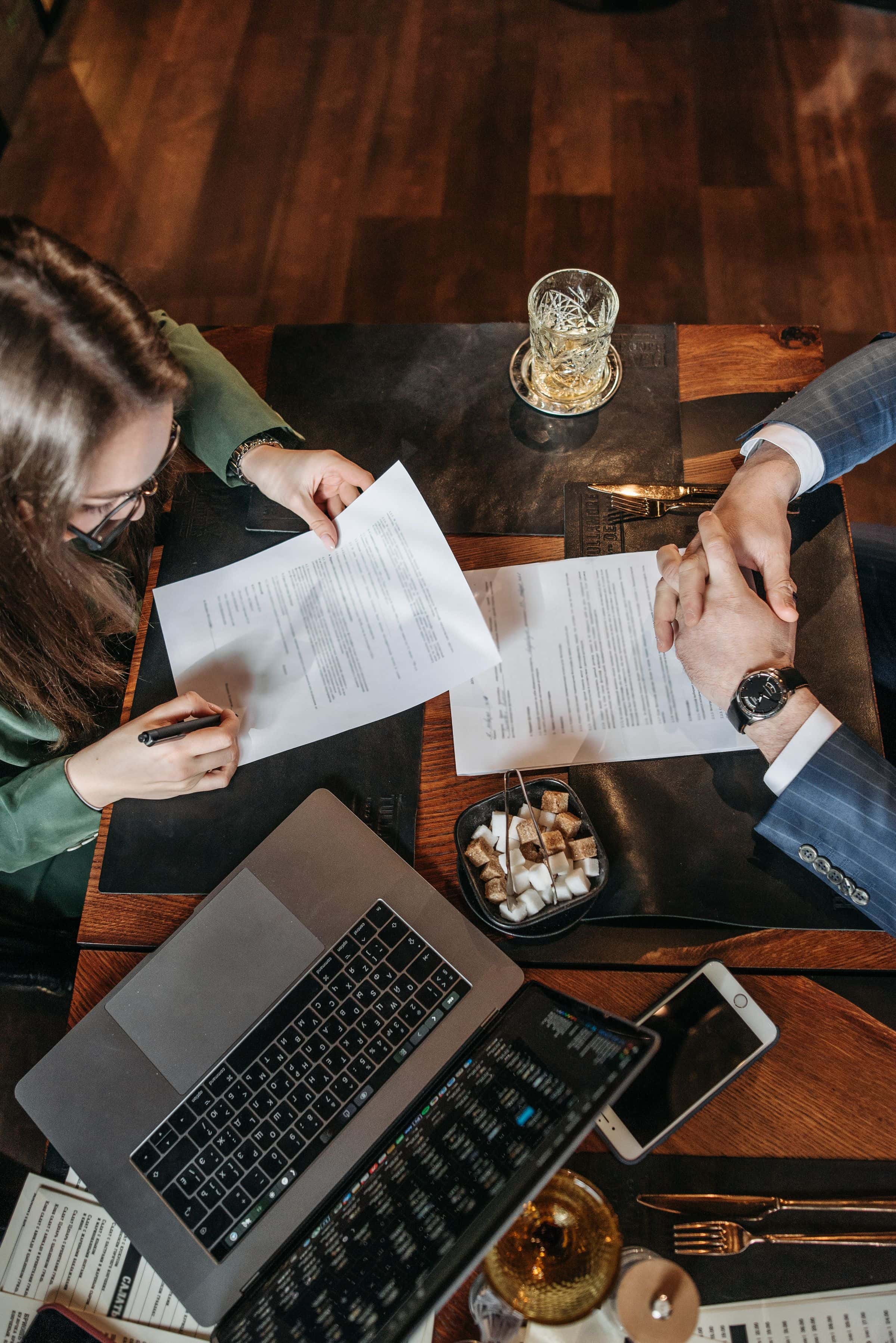Business owner reviewing a source-code ownership clause in a website contract