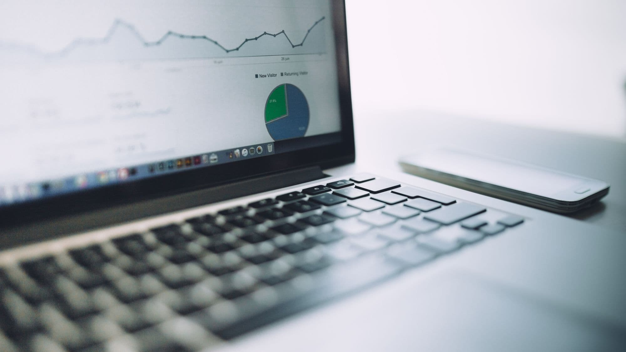 Consultant reviewing a data dashboard for an AI feasibility assessment