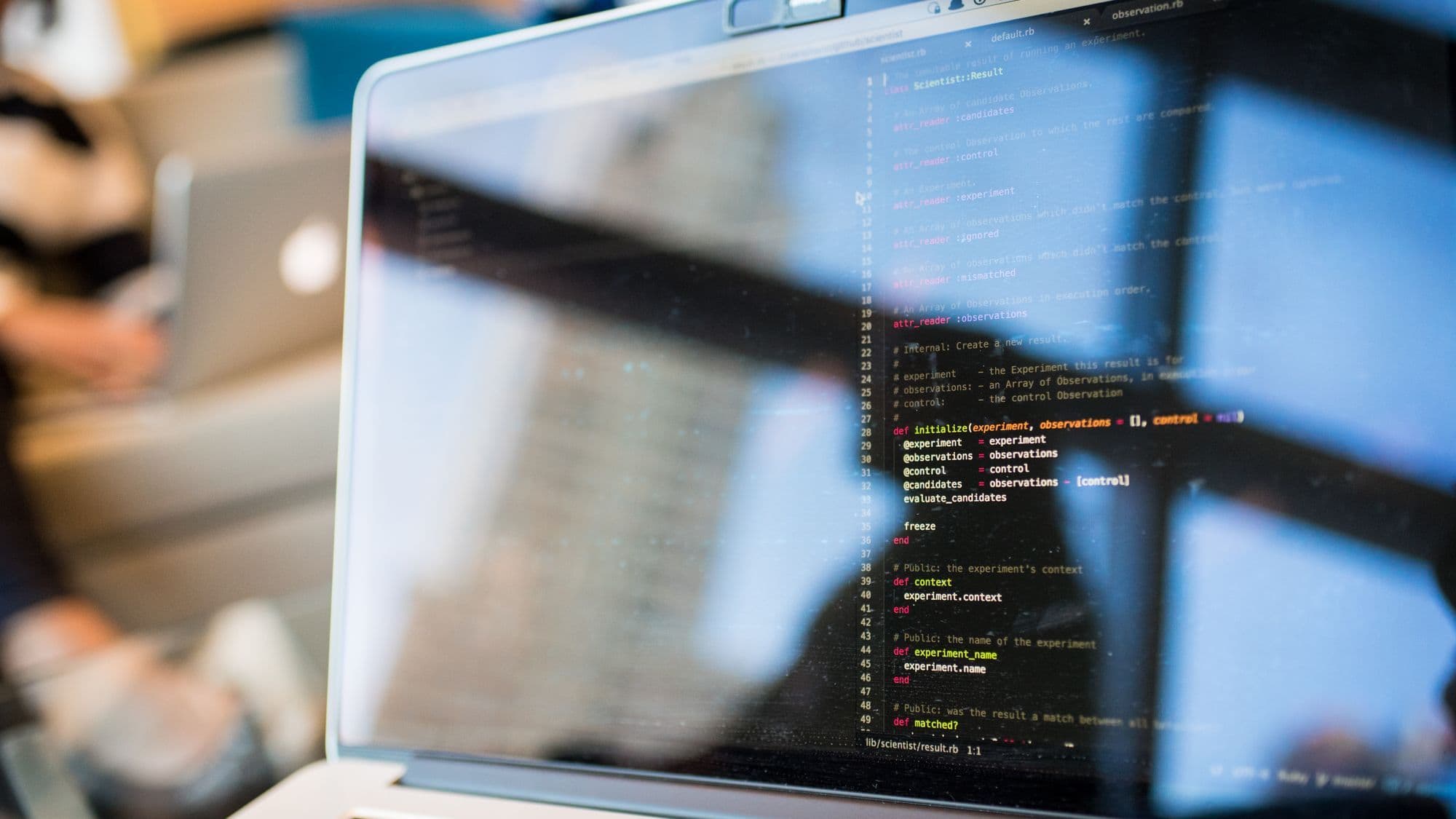 Laptop displaying code that represents a controlled internal AI connection