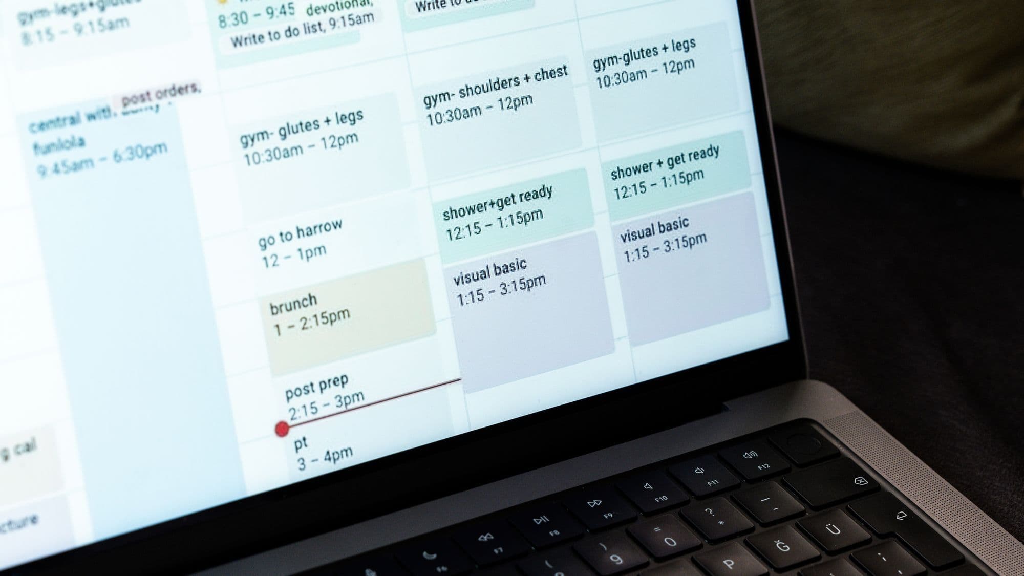 Digital calendar on a laptop representing clinic appointment management