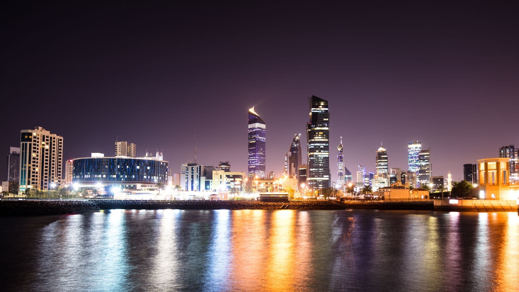 Kuwait City skyline representing connected CRM and ERP systems for Gulf businesses
