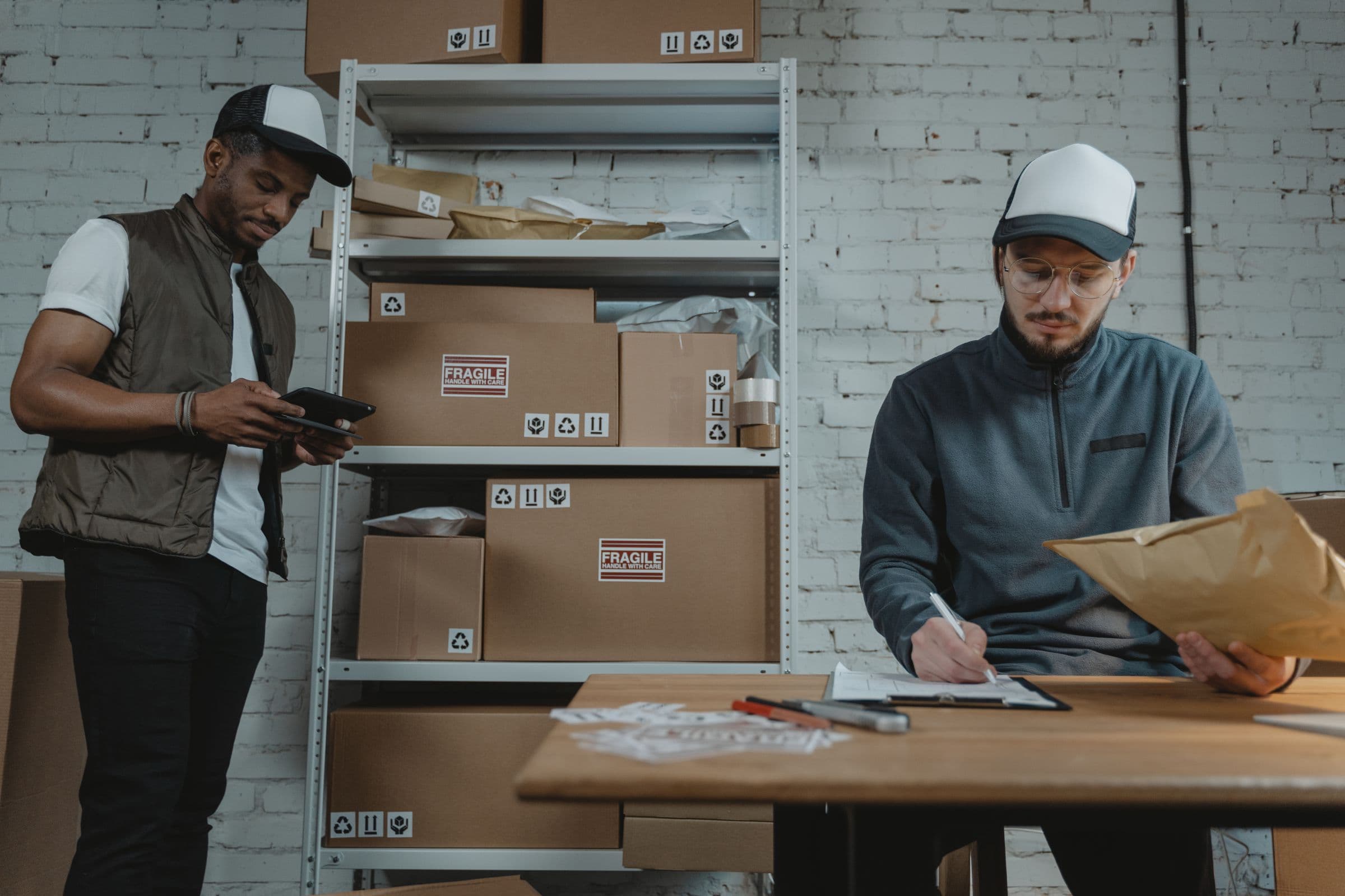 Small ecommerce team preparing first online orders for Saudi customers