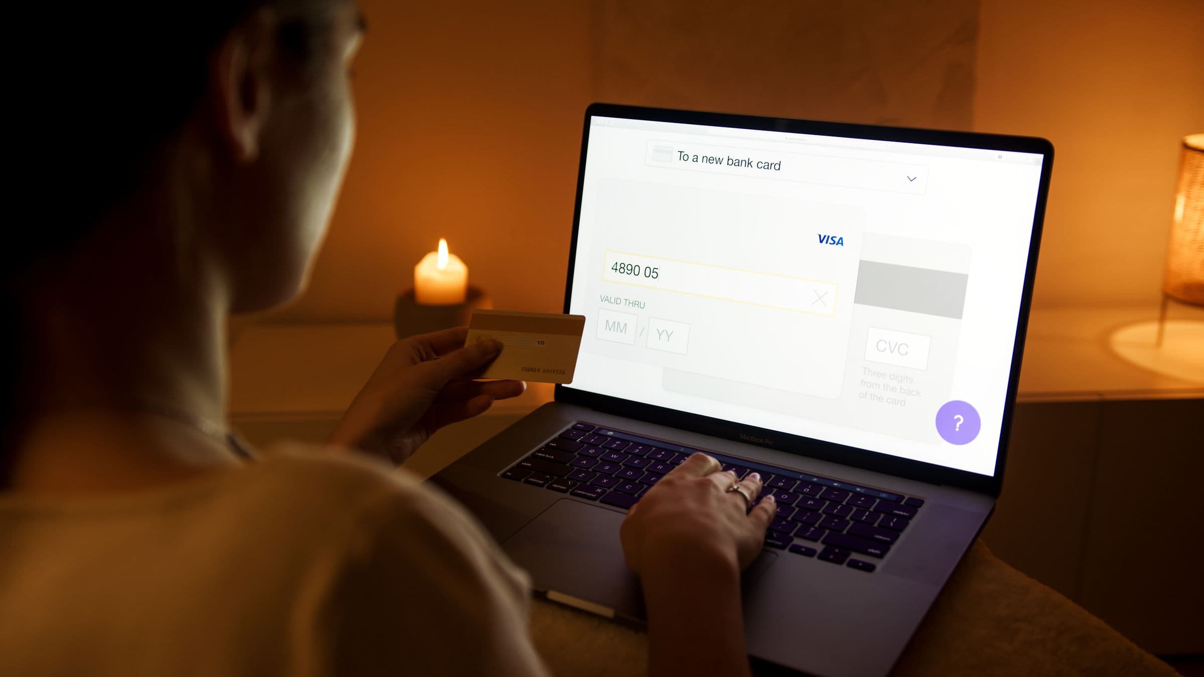 Phone and laptop showing digital payment for a Saudi online store