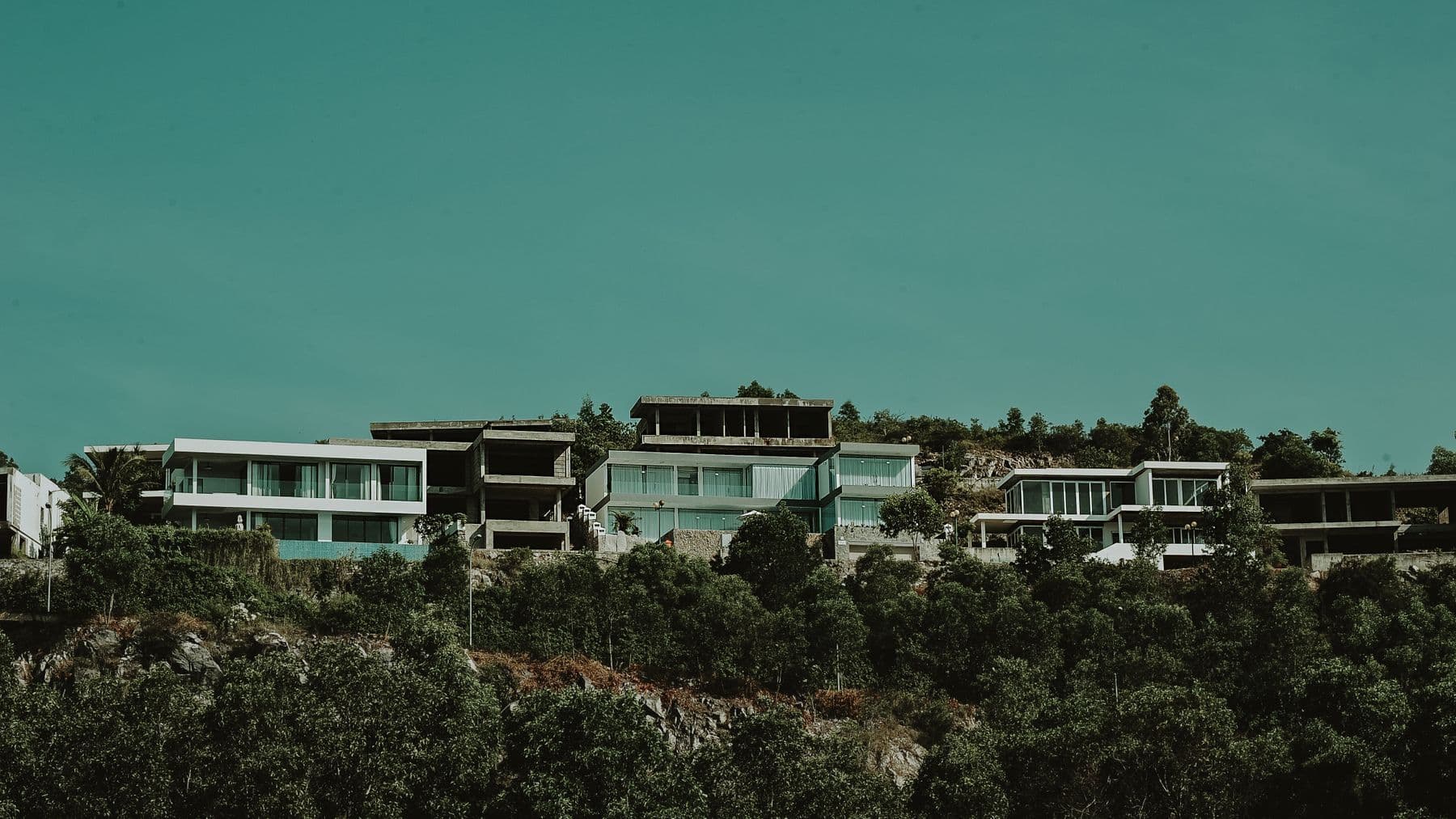 Modern villa listed on a real estate website