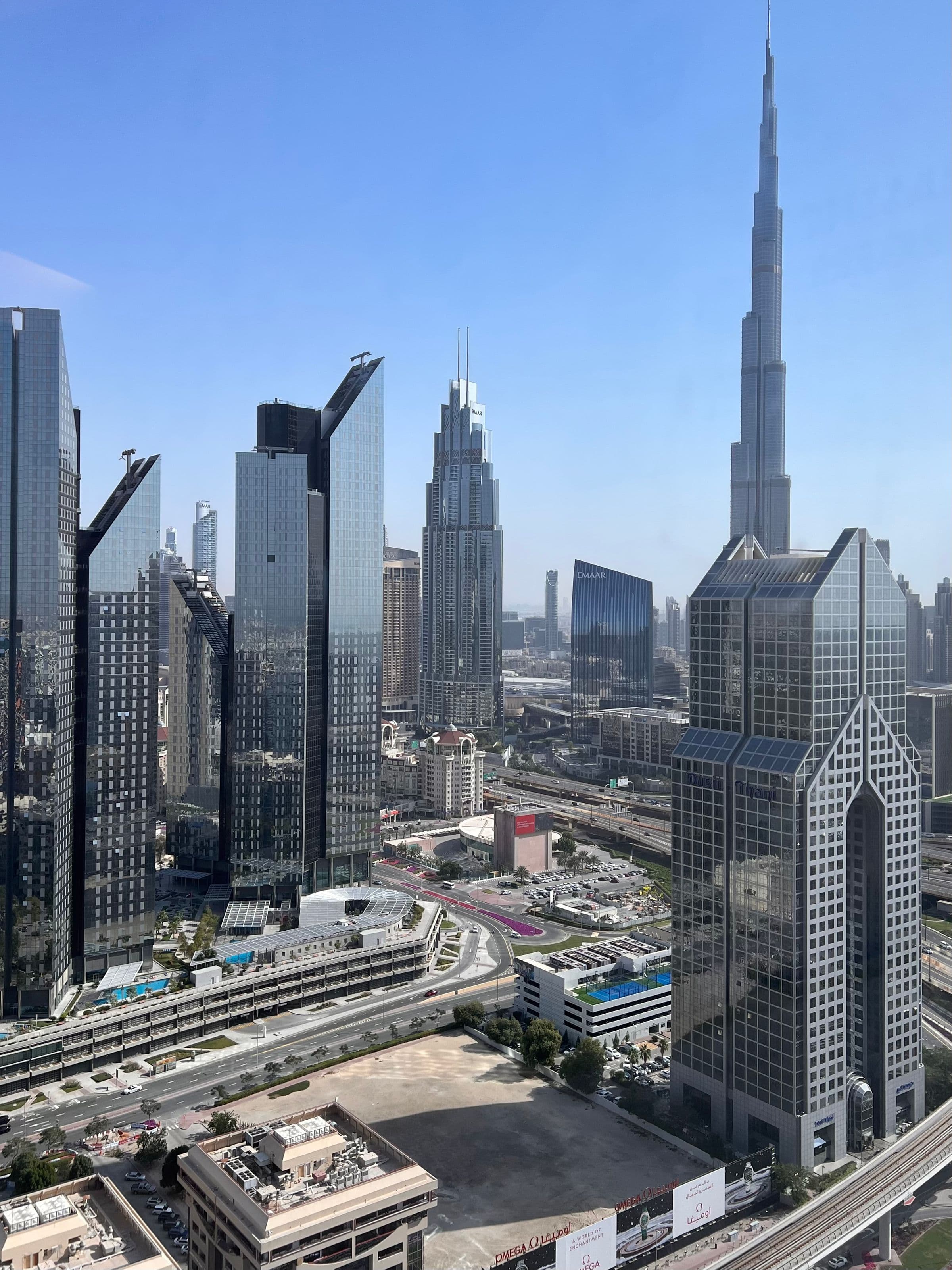 Small business owner using a phone to manage Instagram sales in the UAE