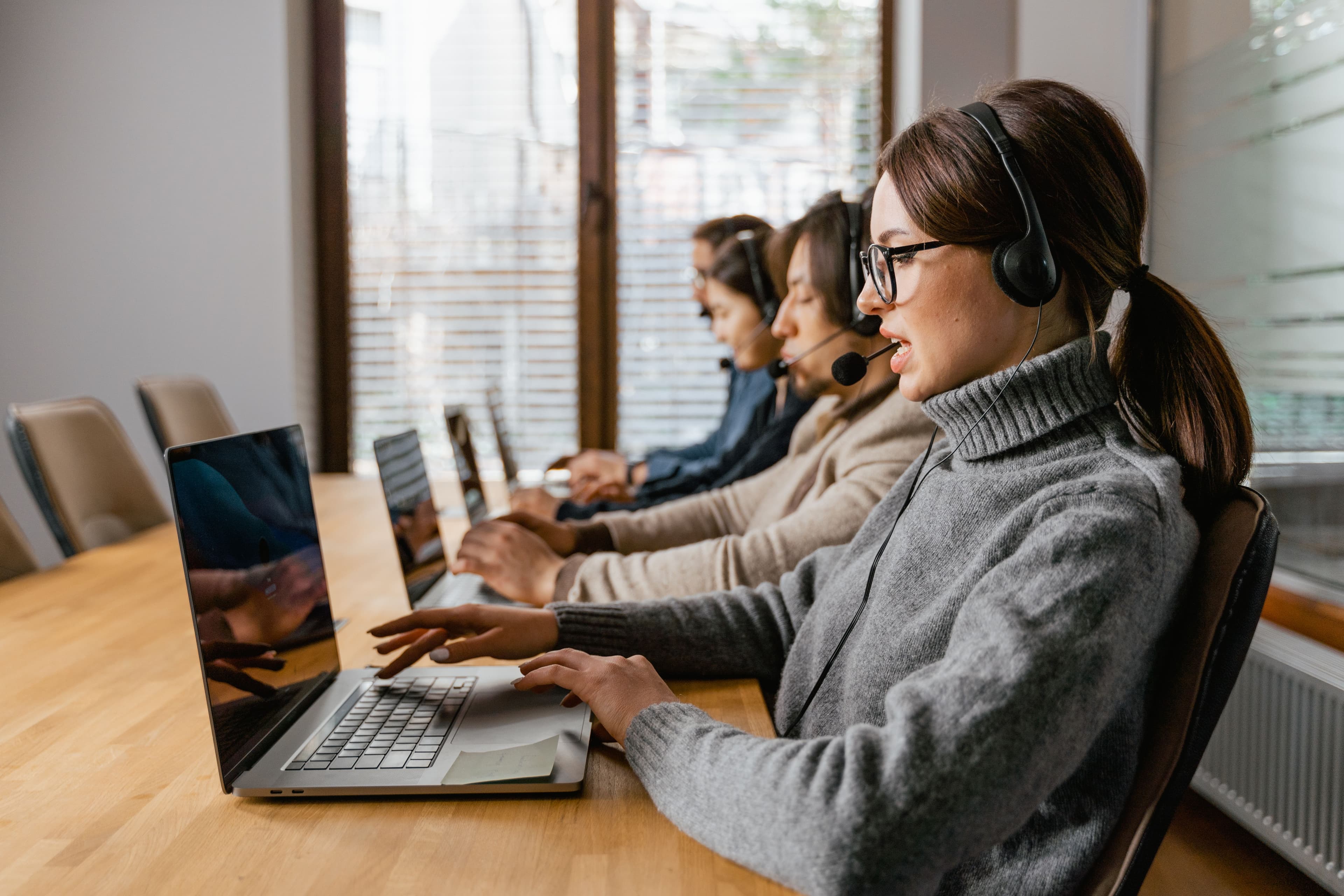 Sales professional using a computer during a CRM implementation