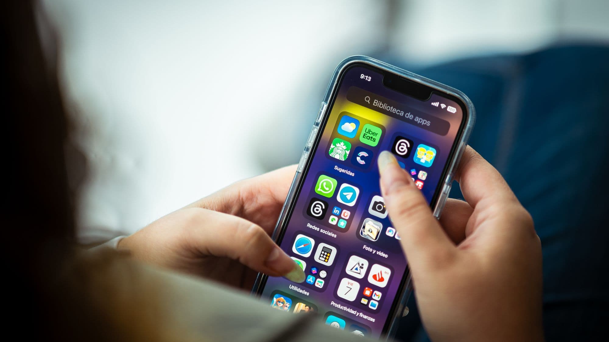 A traveller using mobile applications to research and manage a booking